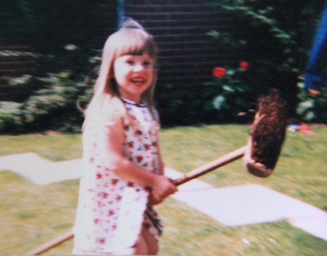 My second daughter (afairymind) in a oicture which displays her love of making up stories from a very early age.