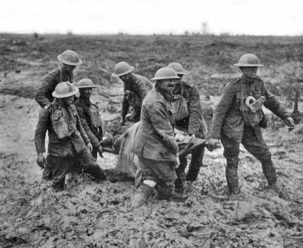 Stretcher bearers at the Battle of Passchendale. August 1917. Author: John Warwick Brooke. Public Domain.