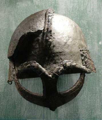 Viking helmet from Gjermundbufunnet, now at Kulturhistorisk museum. Author: J Jeblad. Creative Commons